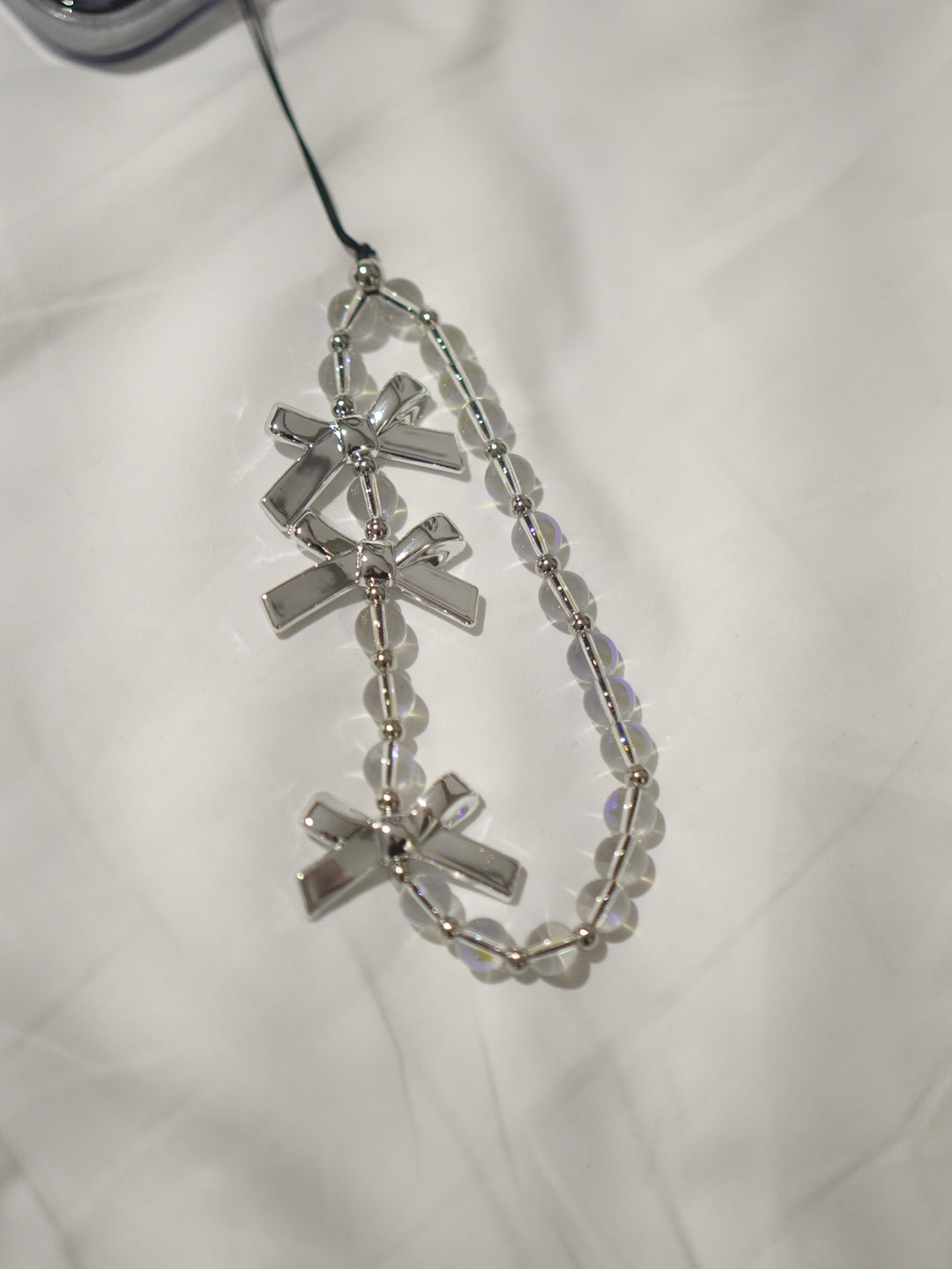 銀色蝴蝶結電話繩￼